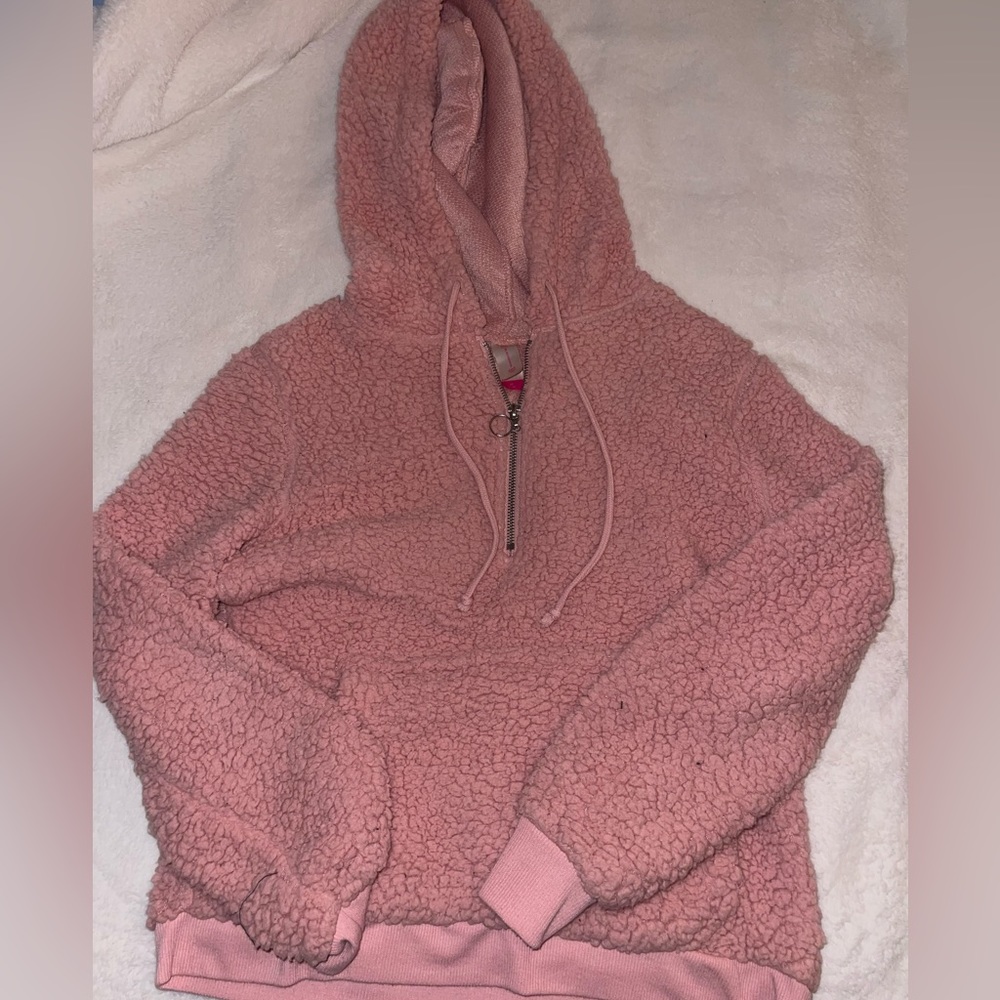 pink fuzzy sweater